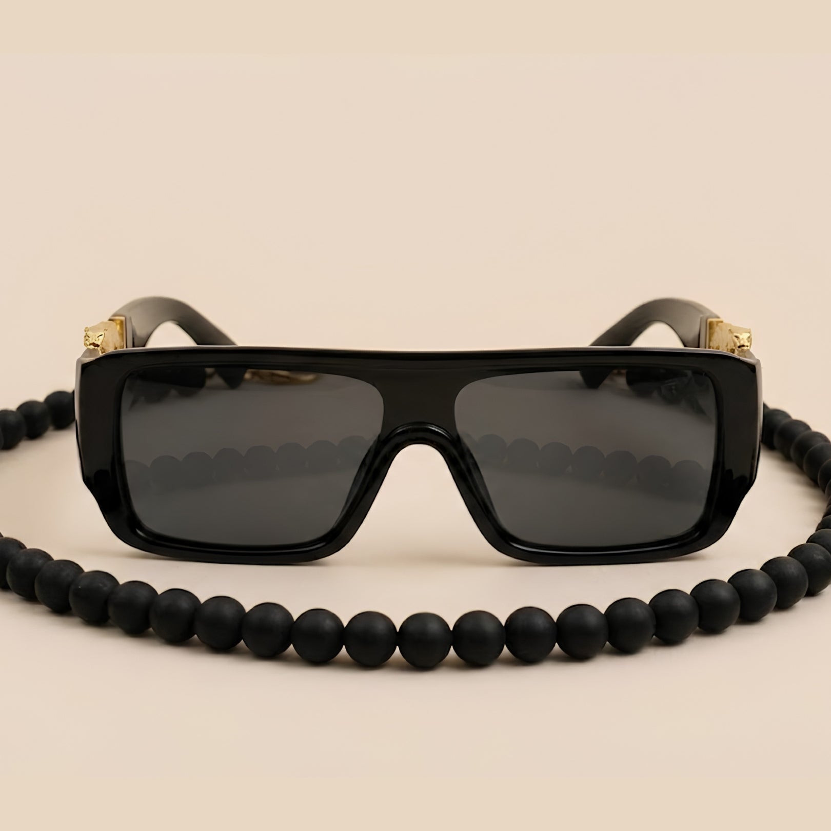 Sunglasses with Gold Cheetah Emblem